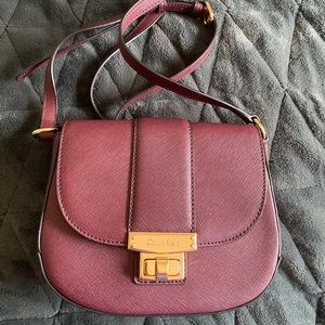 Calvin Klein plum small purse with gold accents